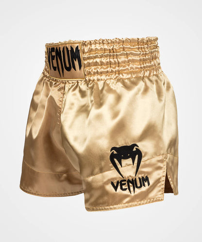 Pantalon corto de muay thai Venum Classic, dorados y negros