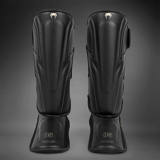 Venum Impact Evo Espinilleras - Negras