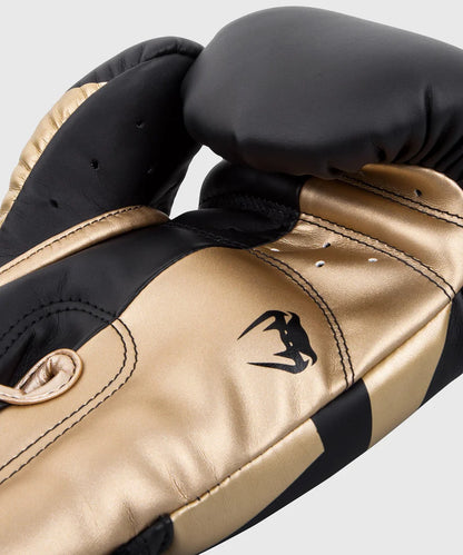 Guantes de boxeo Venum Elite, color negro y dorado